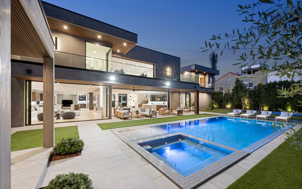 An,Evening,View,Of,An,Outdoor,Pool,Located,On,A
